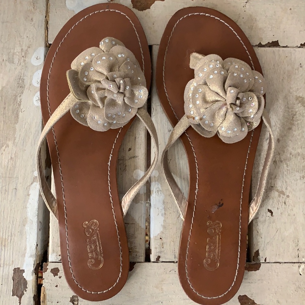 Gold flip flops